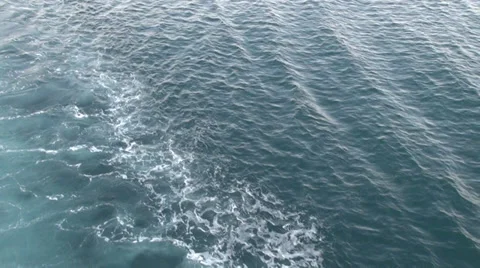 Foamy waves behind ship, ferry boat trail, yacht, sea blue water, waveform Stock Footage 37865319