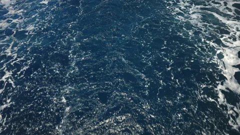 Foamy waves caused by a motorboat Stock Footage 219967200