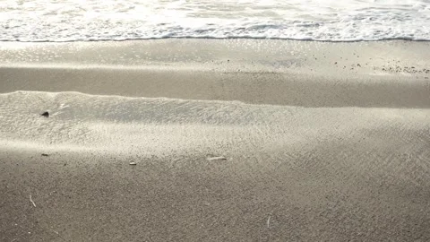 Foamy Waves Gently Lapping Sandy Beach. Stock Footage 257207341