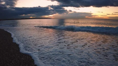 Foamy Waves on Pebble Beach at Sunrise in Antalya Vídeos de archivo 333189809