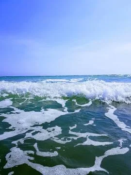 Foamy waves Stock Photos