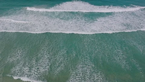 Foamy Waves Slowly Rolling Over The Sea Coast In Razo Beach. Aerial Shot Stock Footage 237918661