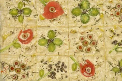 Focaccia art with vegetable flower patterns Stock Photos