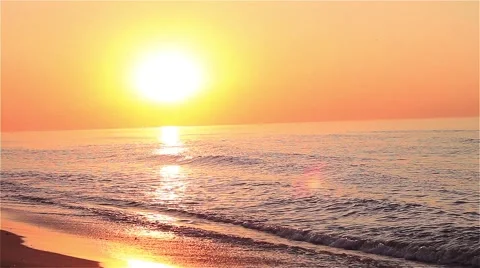 Focus and de focus shot of sunrise with small wave. Stock Footage 54659514