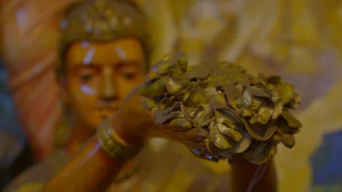 Focus and out of focus view of statue in Gangaramaya Temple Stock Footage 107212259