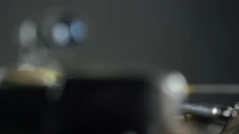 Focus and pan from the tip of the arrow to the aiming device on the crossbow Video stock 144983741