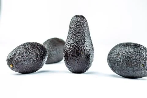 The focus is on the avocado Stock Photos
