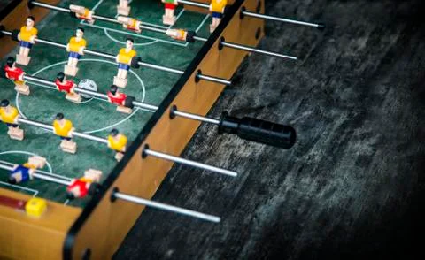 Focus ball in start soccer table game. Boy toy sport game concept. Stock Photos