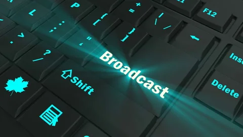 Focus on the blue glowing Broadcast button Stock Footage 100678913