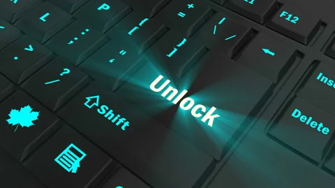 Focus on the blue glowing Unlock button Stock Footage 100689856