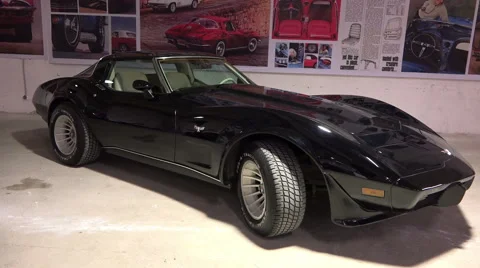 Focus the camera on the envelope Chevrolet Corvette C3 car Stingray 1978 release Vídeos de archivo 46004467