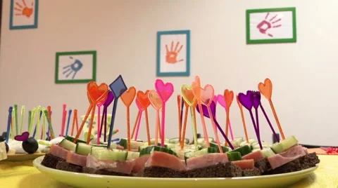 Focus the camera on a sofa on the holiday table of children's holiday Stock Footage 46936968