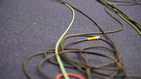 Focus changes on lots of tangled television cables 스톡 동영상 126971203