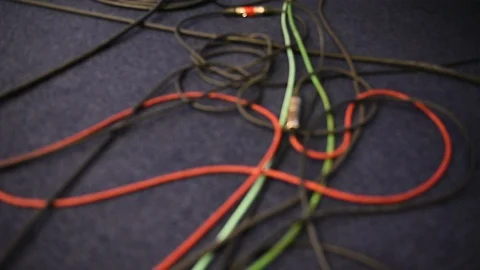 Focus changes on lots of tangled television cables 스톡 동영상 126971407