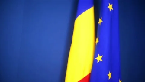Focus changes on Romania's and EU flags 스톡 동영상 73094641