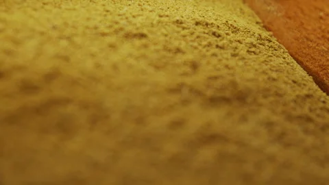 Focus changing on a yellow powder Stock Footage 268766047