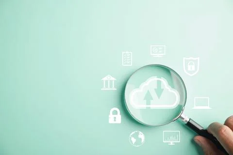 Focus on cloud big data through a magnifier glass Stock Photos