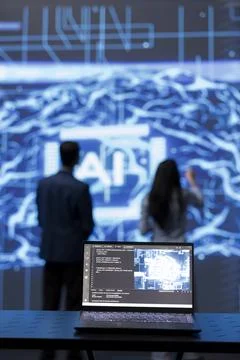 Focus on complex AI brain models being analyzed on laptop by developers Foto stock