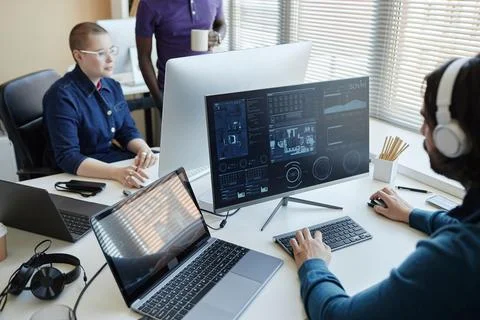 Focus on computer screen with cyber data and laptop on workplace of manager 스톡 사진