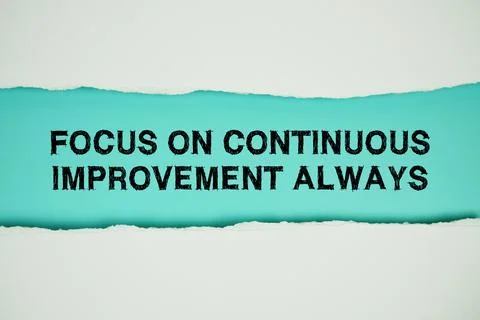 Focus On Continuous Improvement Always text on blue with white paper torn r.. Stock Photos