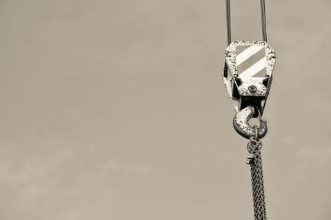 Focus on crane at work, black and white effect Stock Photos