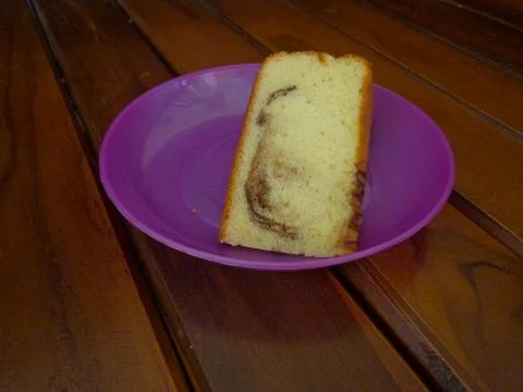 The focus of the delicious sponge cake slice Fotos de archivo