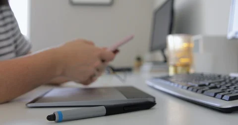 Focus on a digital tablet pencil. Professional retouch artist take a rest Video stock 127388015