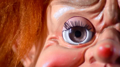 Focus in on the eye of a ventriloquist doll Stock Footage 55076703
