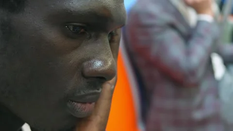 Focus  on face of young african man on the subway with absorbed look Stock Footage 240326790