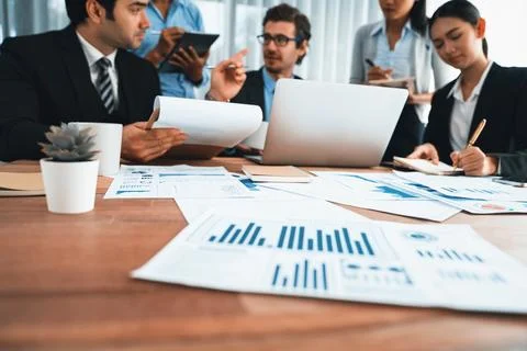 Focus financial data dashboard paper with blurred background. Habiliment Stock Photos