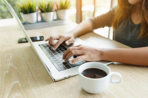 Focus on finger typing on laptop computer Stock Photos