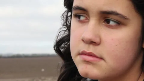 Focus in on gender fluid kid in middle of nowhere Stock Footage 155388474