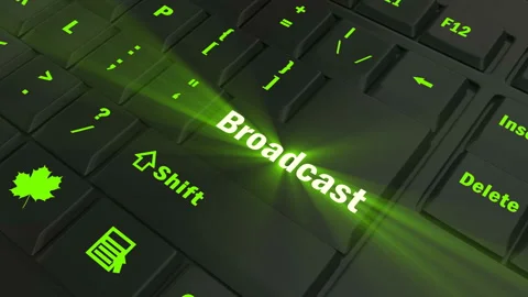 Focus on the green glowing Broadcast button Stock Footage 100678933