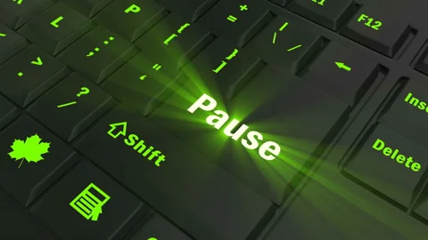 Focus on the green glowing Pause button Stock Footage 100688965