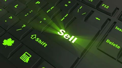 Focus on the green glowing Sell button Stock Footage 100685984