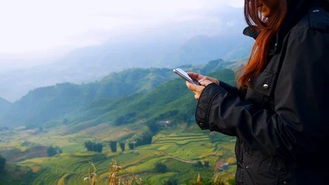 Focus on hands holding cellphone mobile phone to expolore internet and texting m Stock Footage 122172072