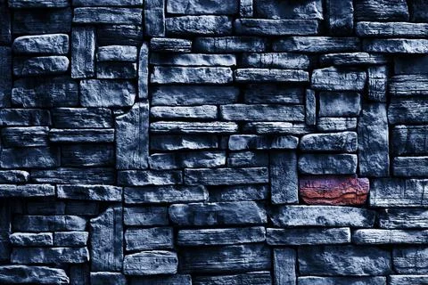 Focus to hard granite wall ancient stone exterior texture Stock Photos