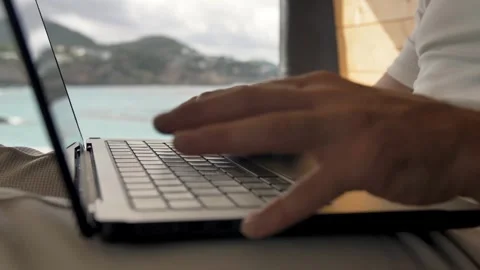 Focus on the keyboard remote work setup in a van with beautiful landscapes Vidéo 291896828