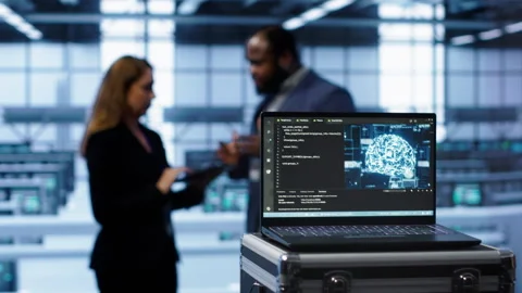 Focus on laptop used by server farm technicians Stock Footage 277644216