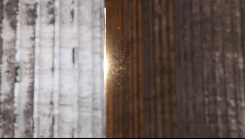 Focus on the messing dust particles in the sunlight beam from bay Видео 6349395