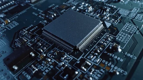 Focus on Microchip, CPU Processor. Printed Circuit Board / Computer Motherboard Stock Footage 120930037