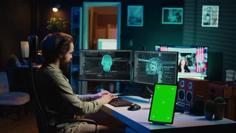 Focus on mockup tablet next to programmer updating artificial intelligence Stock Footage 267045821