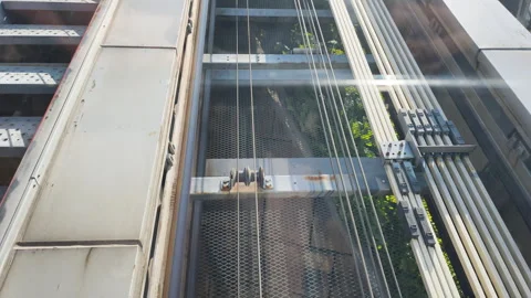 Focus on modern cable transit. Innovation ensures smooth vertical travel Stock Footage 323250859