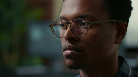 Focus on moving eyes of software developer writing code in front of monitor Stock Footage 168253499