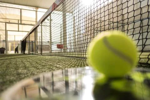 Focus on net. Paddle tennis objects and court. Stock Photos