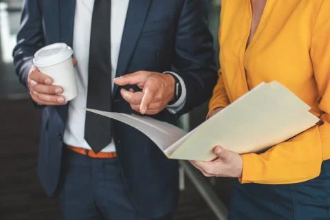 Focus on open paper folder with data Stock Photos