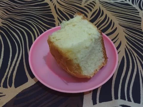 Focus on the plate with a slice of bread Stock Photos