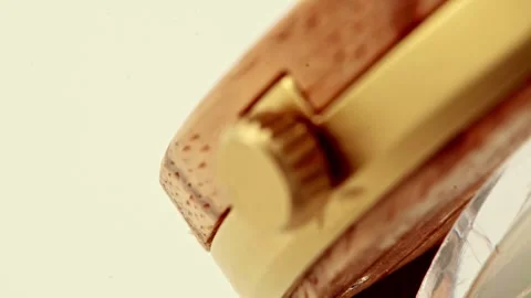 Focus pull across cork watch crown and dial Stock Footage 317086709
