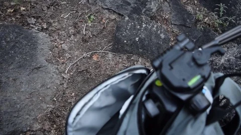 Focus Pull backpack and tripod Stock Footage 79474928