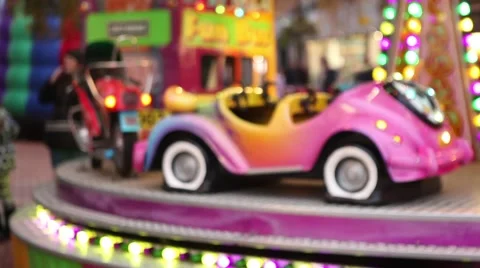 Focus pull on beautiful vintage carousel, colorful bokeh lights Stock Footage 44643213